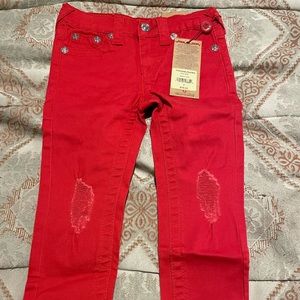 Girls red skinny jeans
